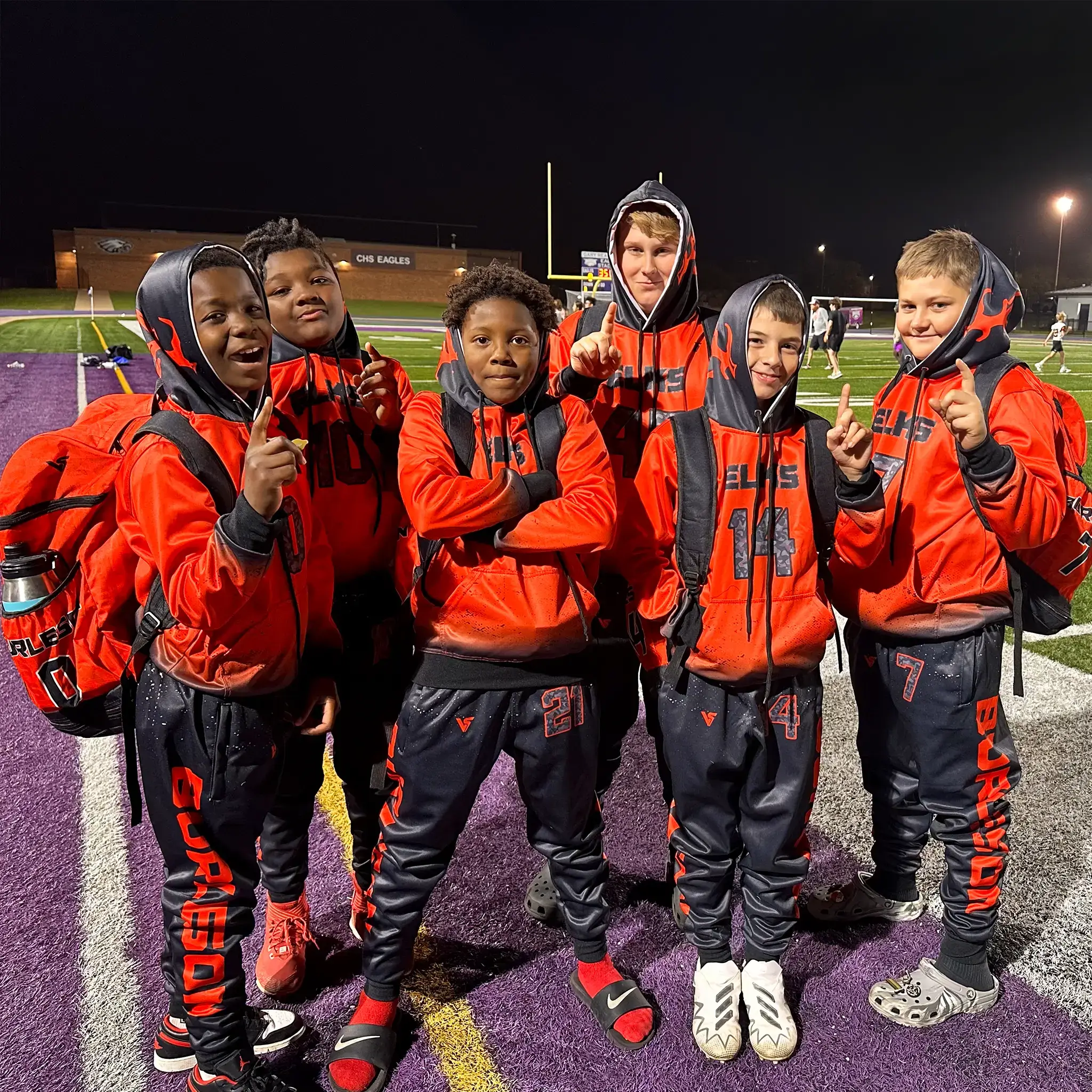 Burleson Elks 7v7 Players in Versus Gear After a Game